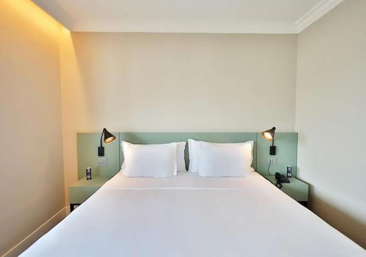מלון סאו פאולו Radisson Oscar Freire מראה חיצוני תמונה A bedroom at the hotel